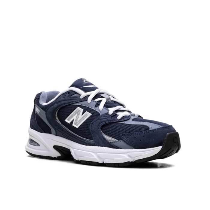Classic navy tone with modern comfort ABZORB cushioning for all-day wear Breathable materials and premium feel